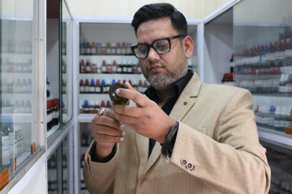 Experienced homeopathic doctor preparing personalized medicine at the Best Homoeopathic Clinic in Lucknow
