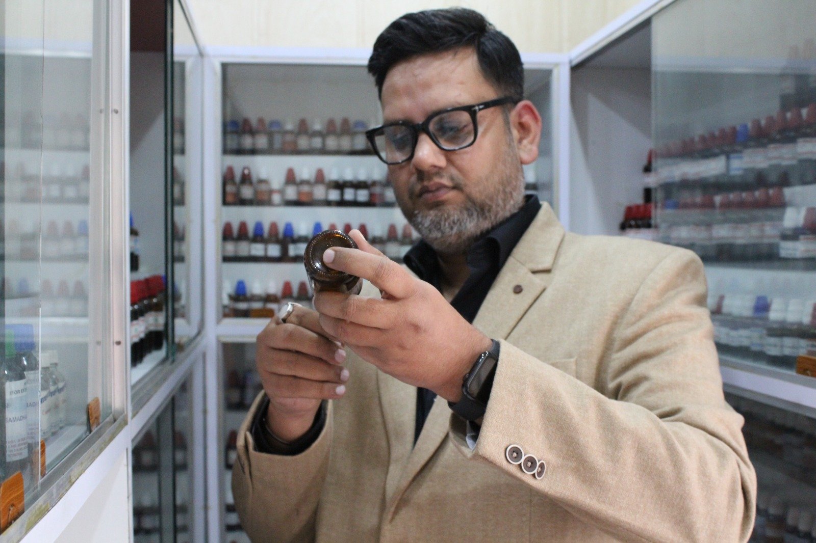 Experienced homeopathic doctor preparing personalized medicine at the Best Homoeopathic Clinic in Lucknow